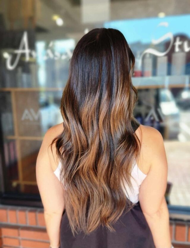 Reverse balayage magic by Jimena—adding depth, dimension, and a seamless shadow root for that luxe lived-in finish. This transformation speaks in tones. Swipe for before.  #ReverseBalayage #DimensionalColorVibes #BeforeAndAfterHair #temeculasalon #temeculahair #anasahairstudio