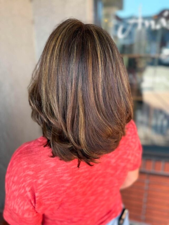Ribbons of caramel woven through rich brunette. Marley built dimension throughout with a fresh all over color, then cut and blew it out smooth and glossy for a finish that catches the light from every angle. Precision color paired with precision cutting.