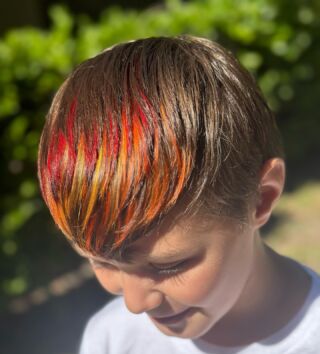 🔥🔥 fire inspired color for this little dude. 
Color by @yer_awizard_hairy 
#firehair #temeculastylist #anasahair #pravana #pravanavivids #hair #hairstyle #boyshaircut