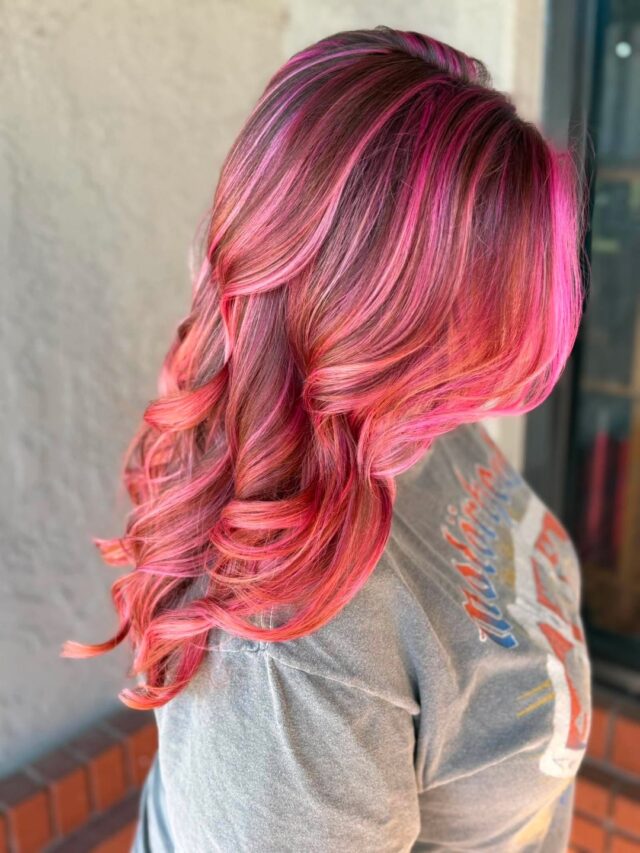 Jenna took this look from natural to a full spectrum of pink, magenta and coral, with dimension that shifts color depending on the light. Curled or straight, this color does not sit still. Vivid, warm, and made to be noticed. Swipe for before.
#anasahairstudio #temeculasalon #temeculahair #vividhair #haircolor #pinkhair #colormelt